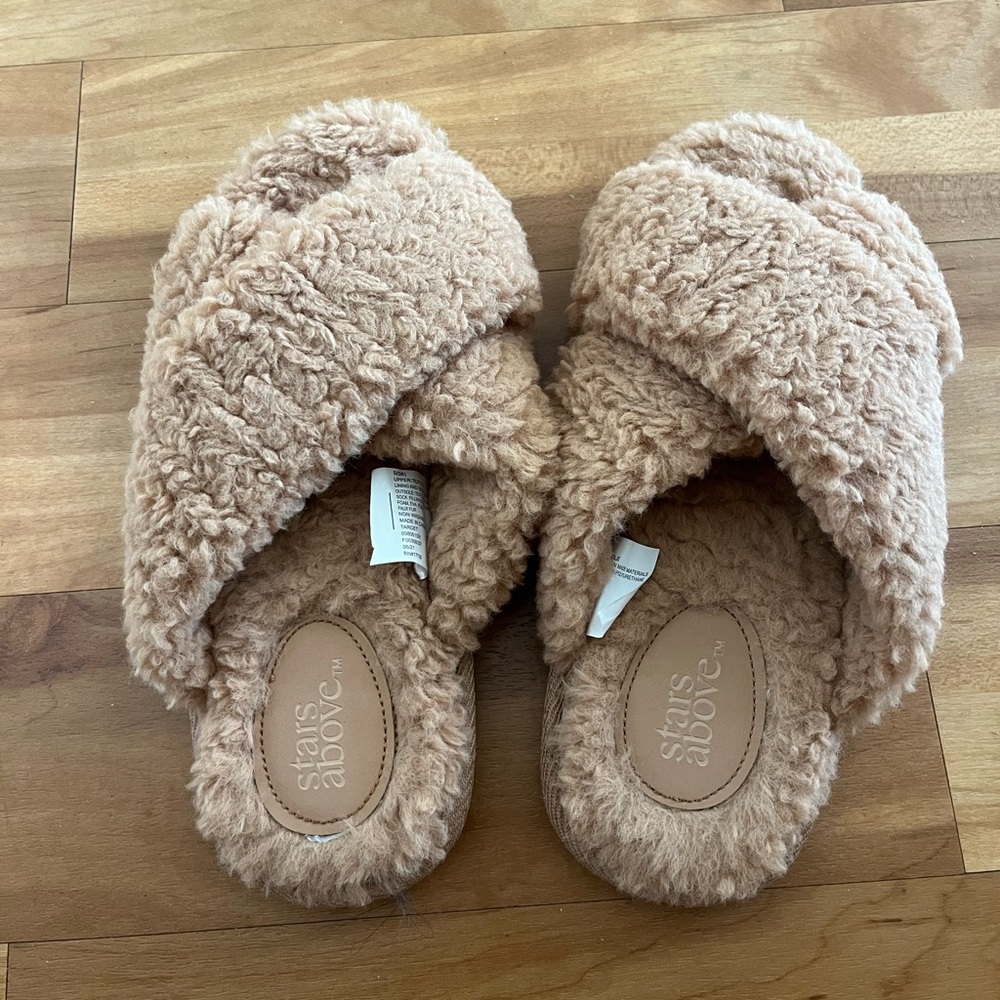 Stars above fuzzy slippers